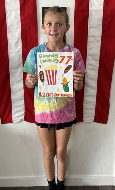 Young girl holds carnival poster before American flag.